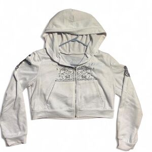 White zip-up Urban Couture cropped jacket.